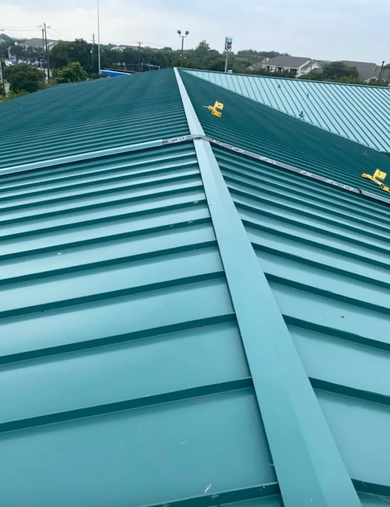 Green commercial metal roof ridge and valley for Metal Roof Repair in Elmwood Park