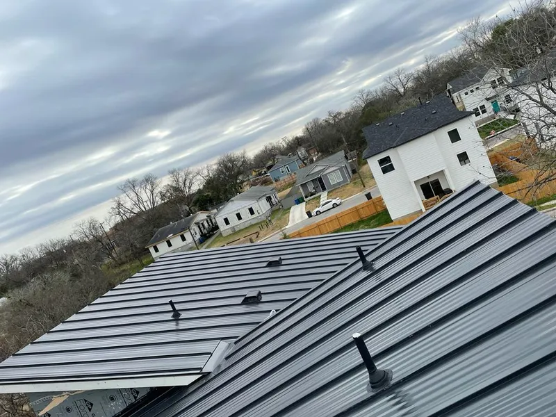 Standing seam metal roof panels with vents for Skylight Repair in Elmwood Park